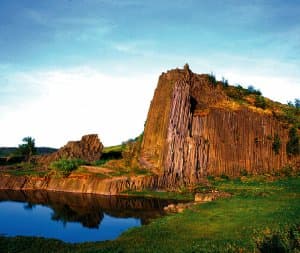 Sandstone tower reflected in a pond – Czech sandstone climbing with Rockbusters