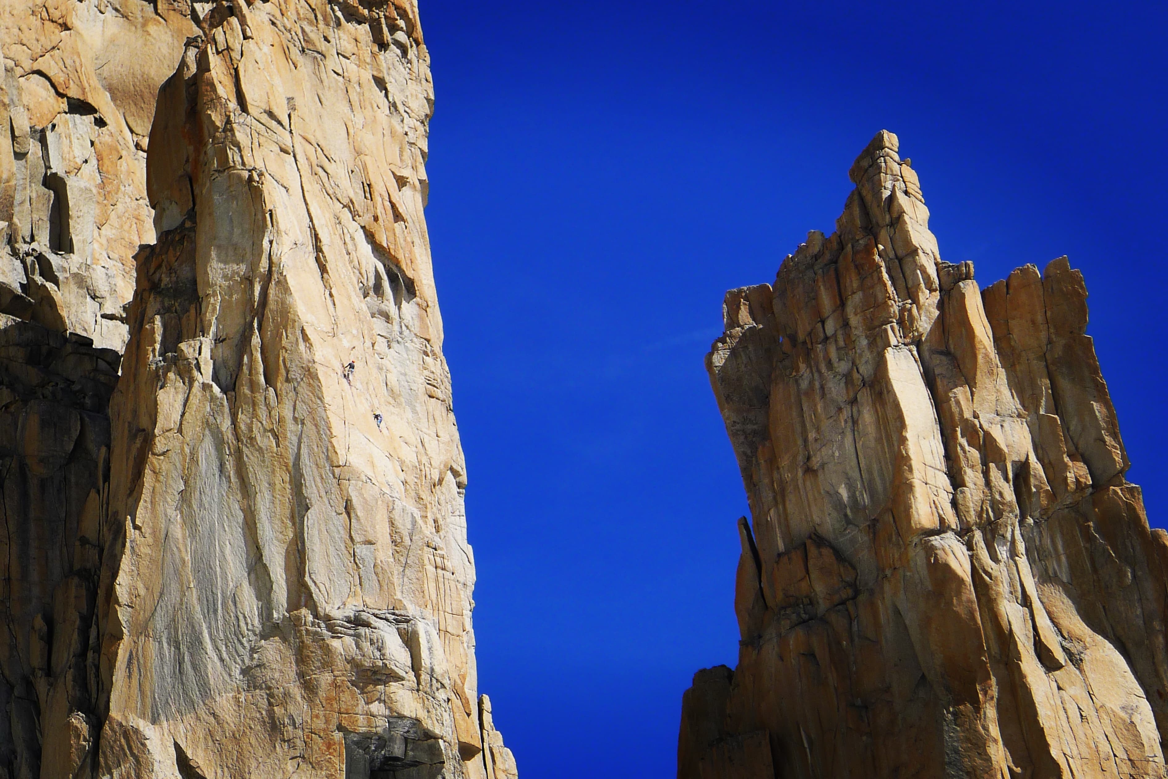Granite spires against a deep blue sky in Chamonix, France – Rockbusters big wall climbing