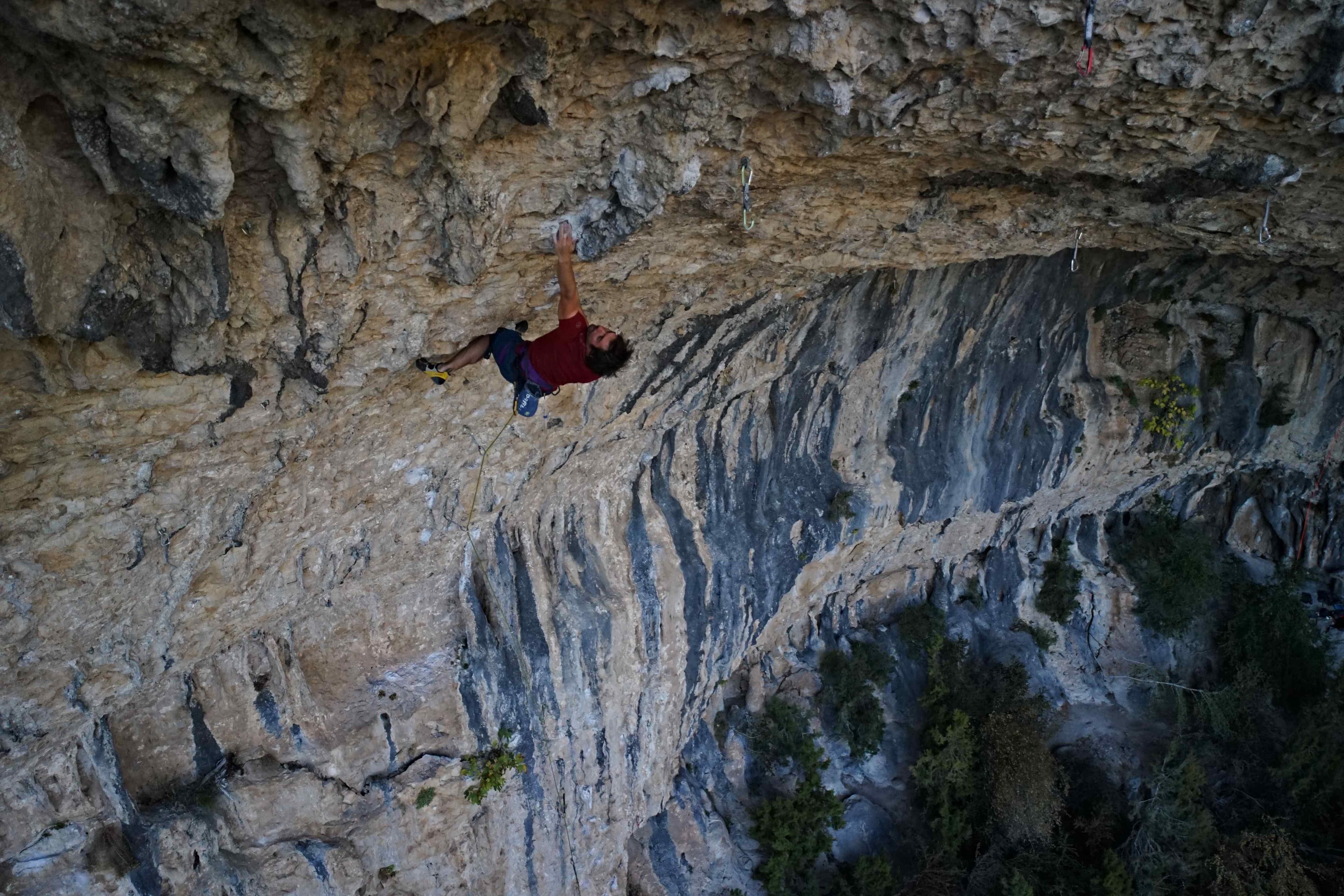 Andrlac climbing Botanic 8b+ in Rodellar, Spain – Rockbusters