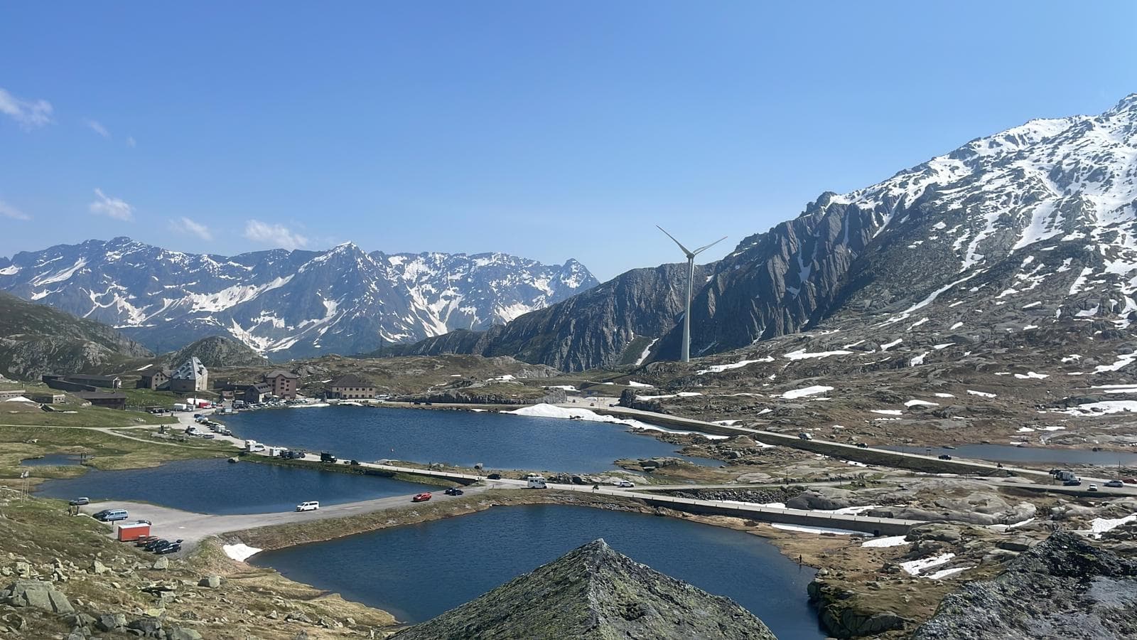 Alpine pass with lakes and snowy peaks in Switzerland on the drive to Magic Wood – Rockbusters
